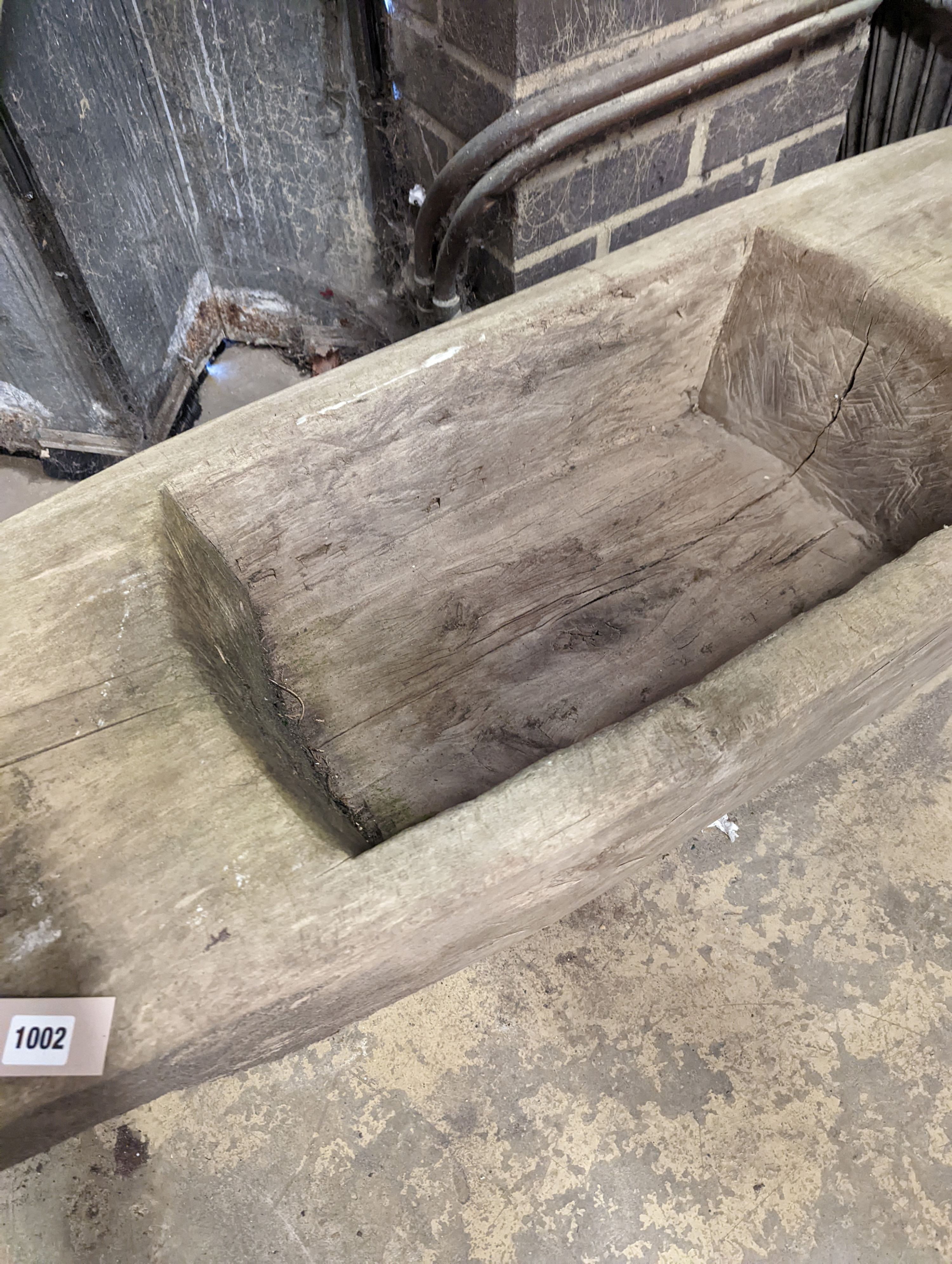 A Continental carved wood trough, width 112cm, depth 44cm